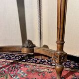 Half-moon console in Louis XVI style made of carved wood.