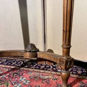 Half-moon console in Louis XVI style made of carved wood.