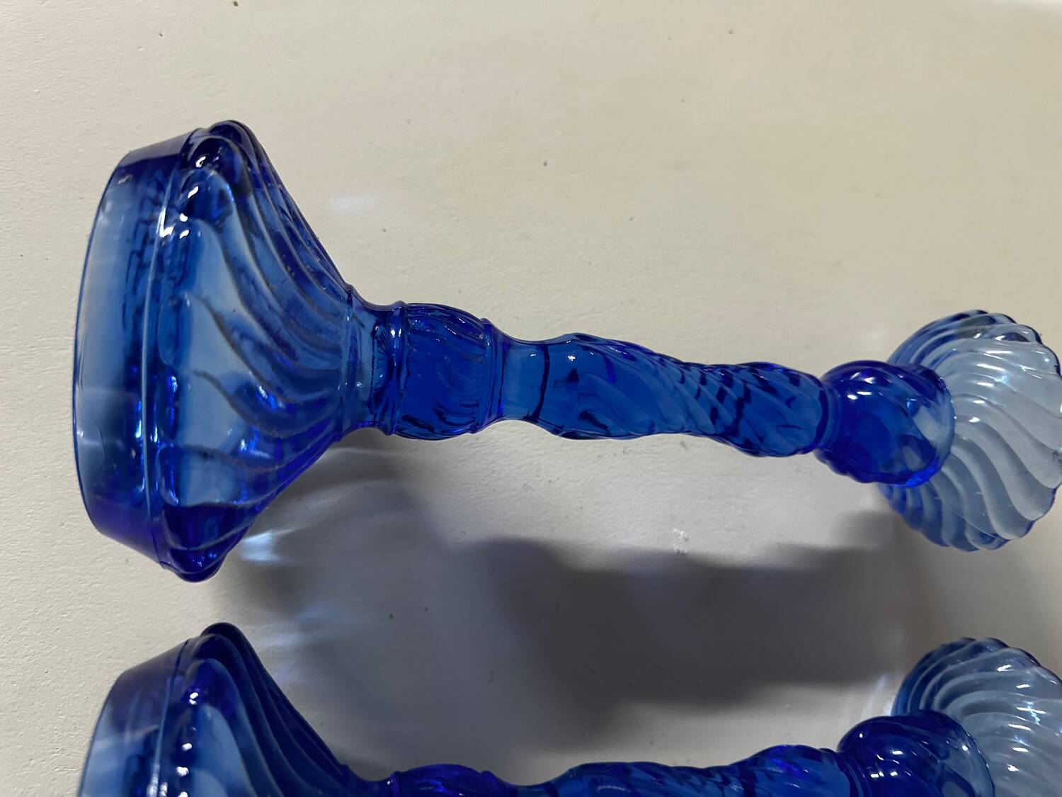 Pair of vintage cobalt blue twisted glass candlesticks h 24.5 cm