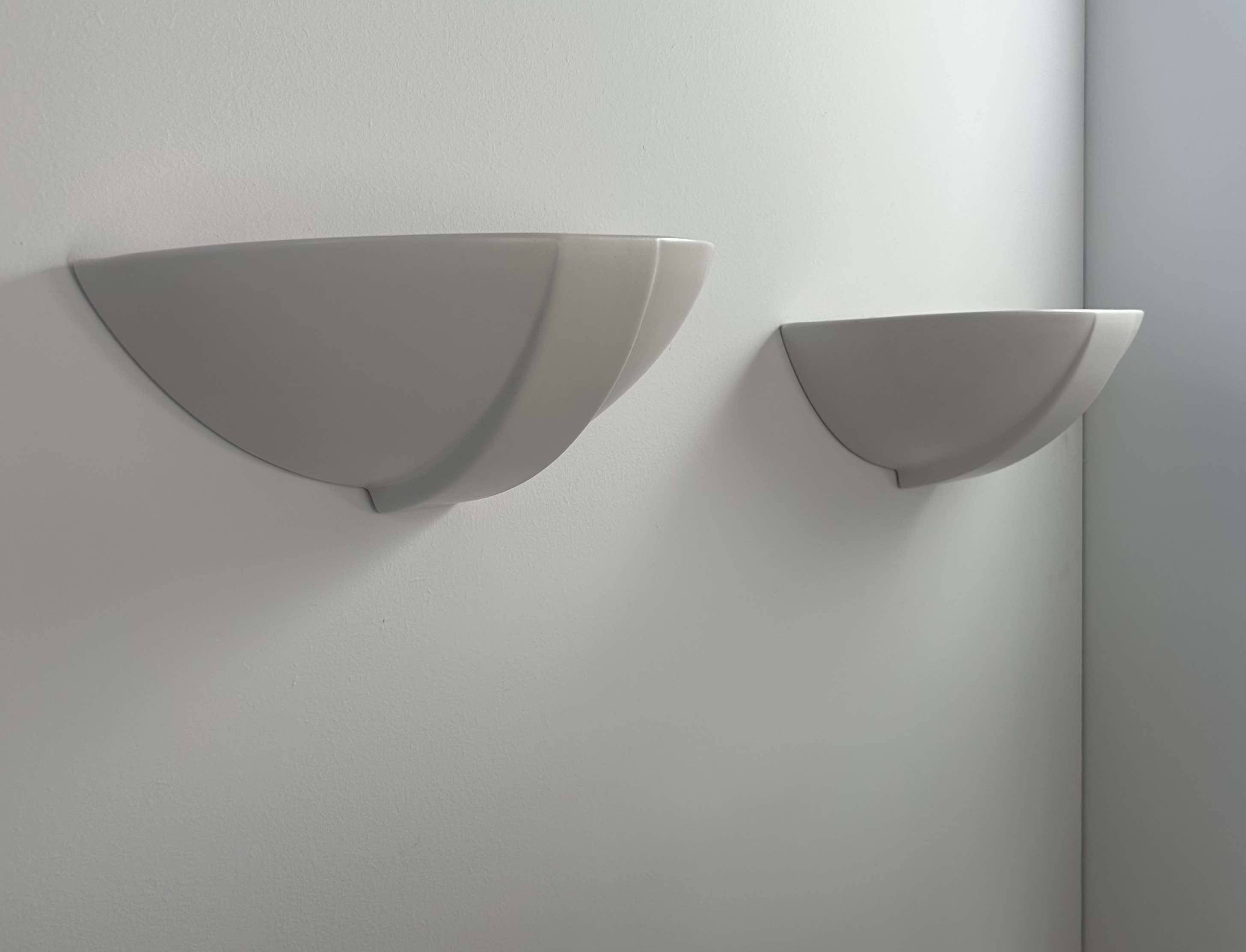 Pair of vintage matte white porcelain wall lights, France 1970.