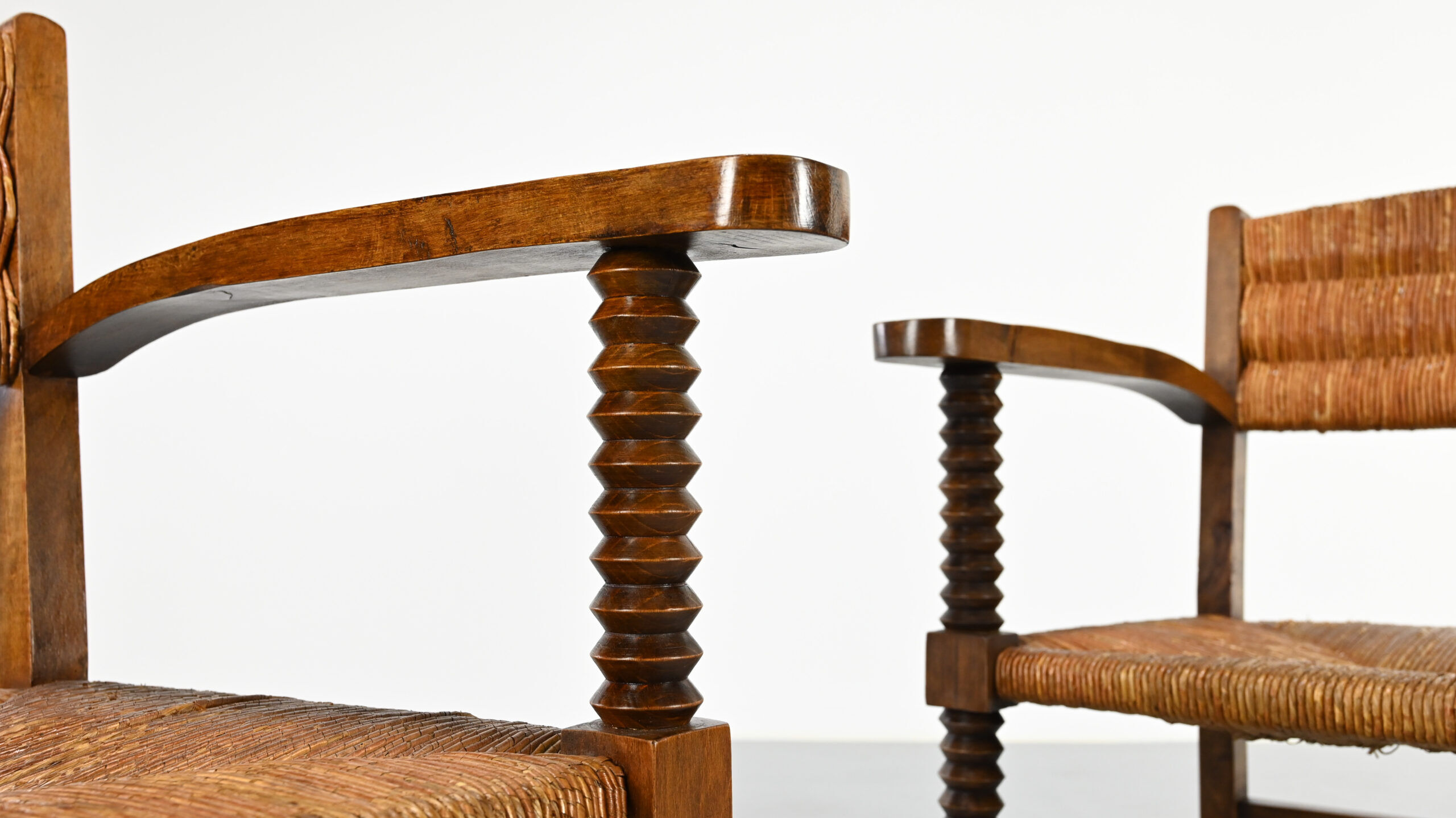 Pair of French armchairs with twisted legs in the style of Charles Dudouyt, France, 1940s.