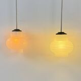 Pair of vintage pendant lights, blown white glass, France, 1970.