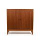 Armoire danoise à porte tambour en teck des années 1950