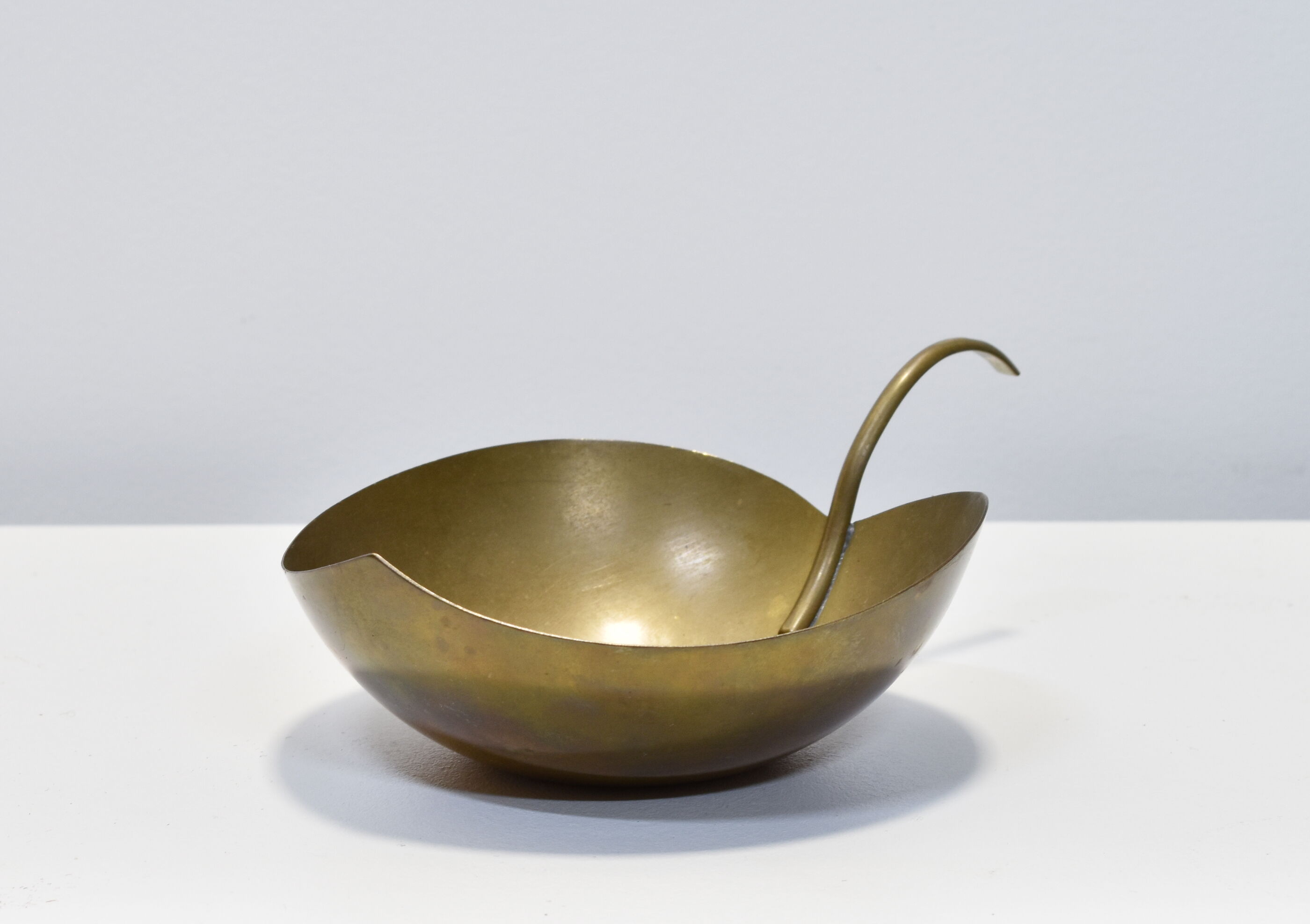 Empty brass leaf pocket