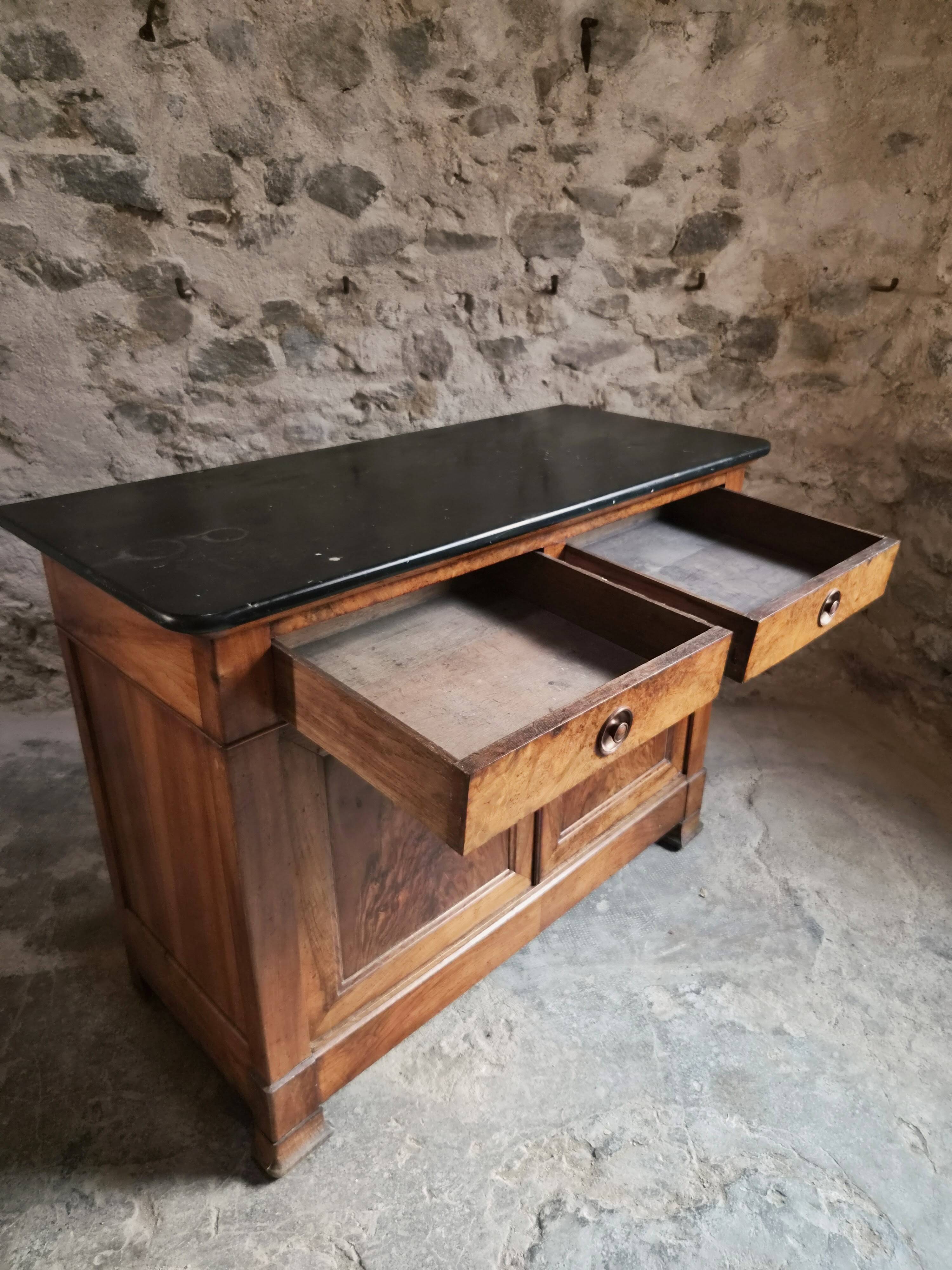 French Louis Philippe walnut buffet with black marble top, France, circa 1840–1860.