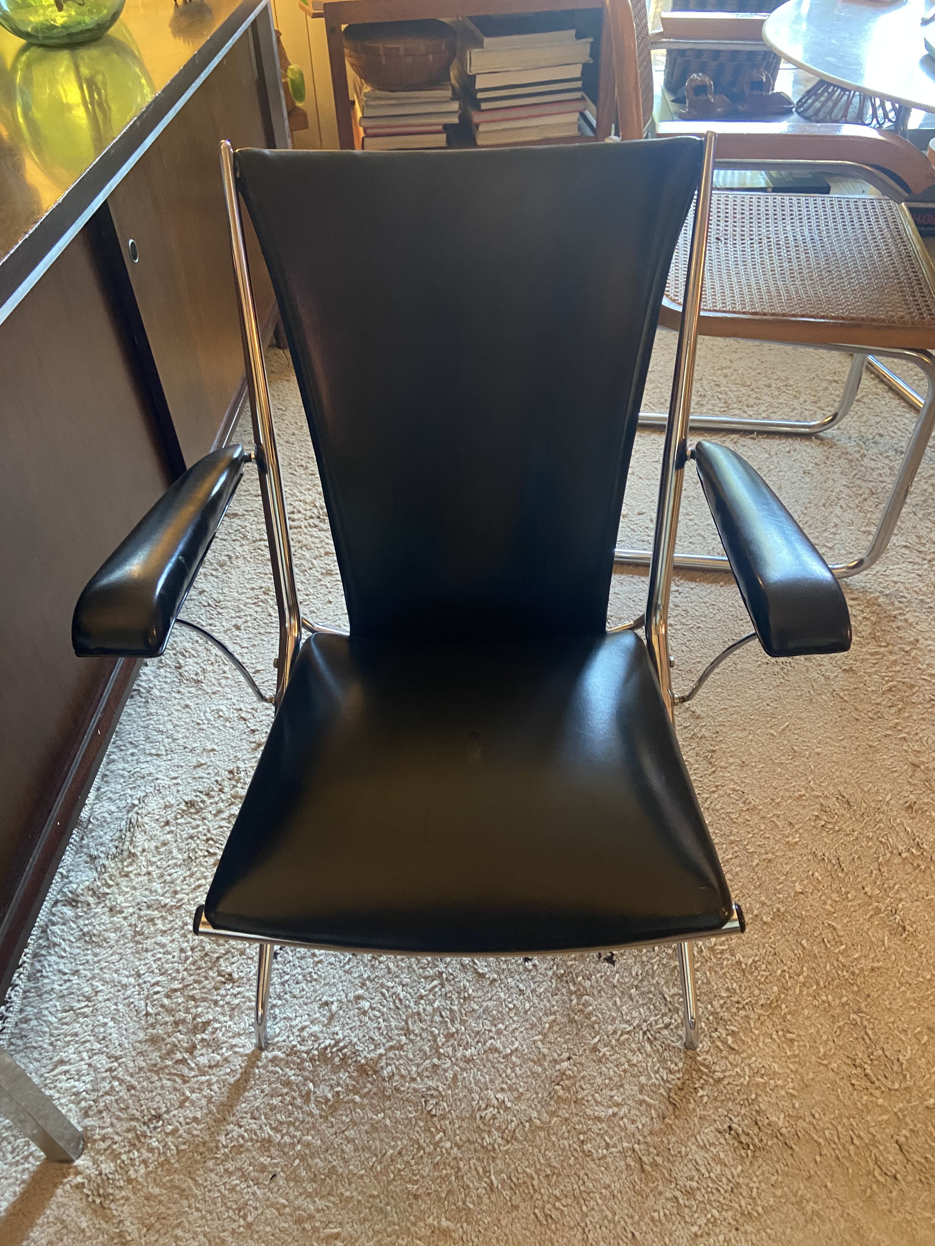 Metal armchair and black skaï