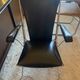 Metal armchair and black skaï