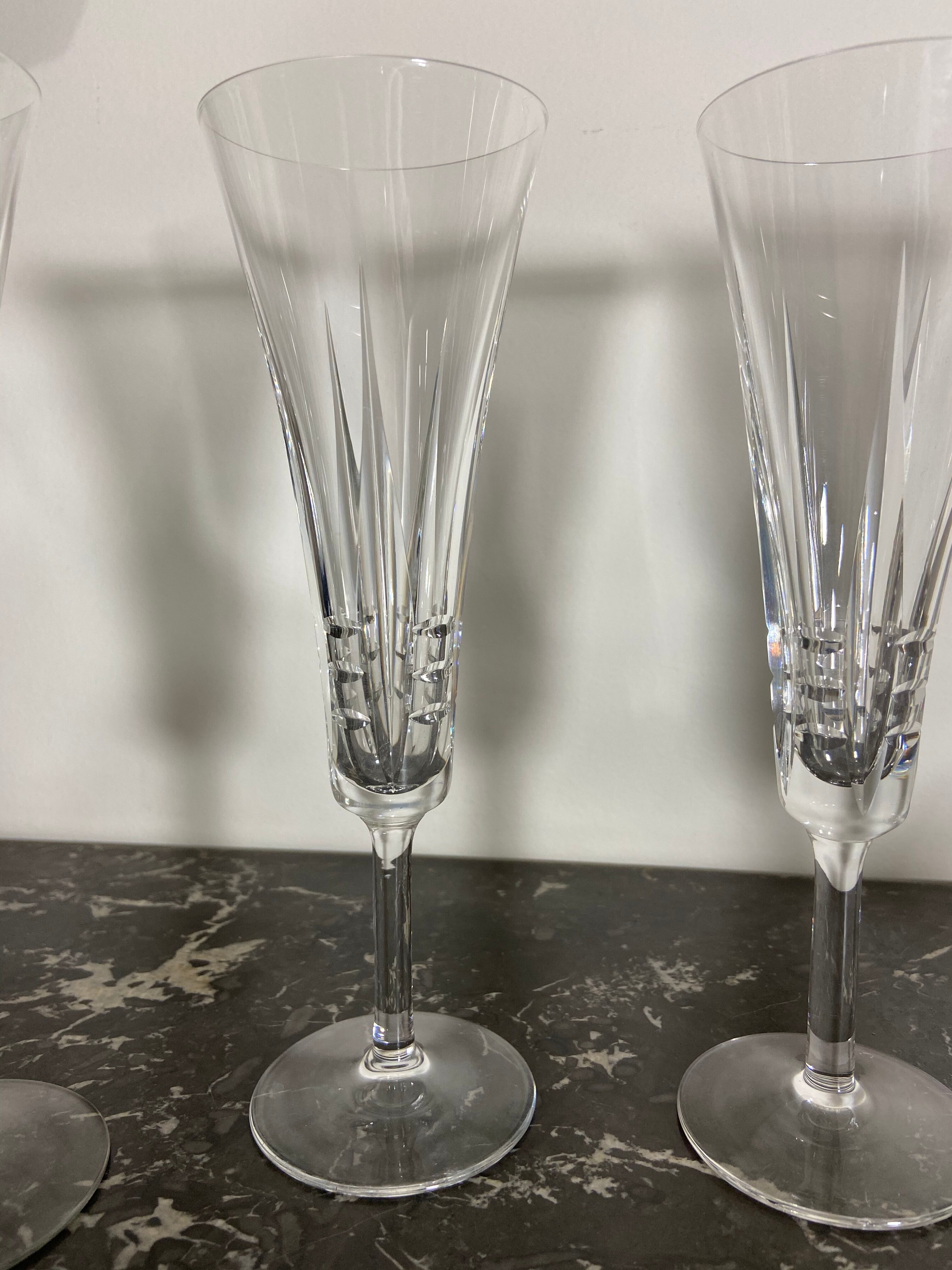 Series of 4 vintage crystal champagne flutes
