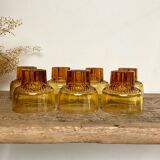 7 small amber glasses