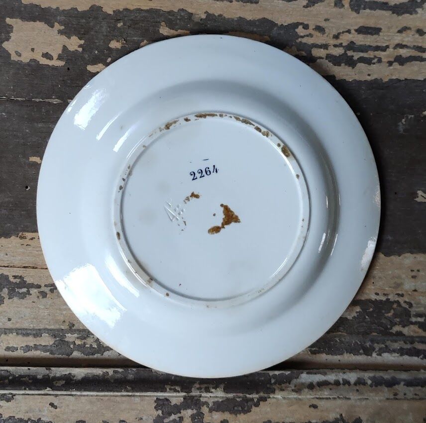 Set of four flat plates in iron earth