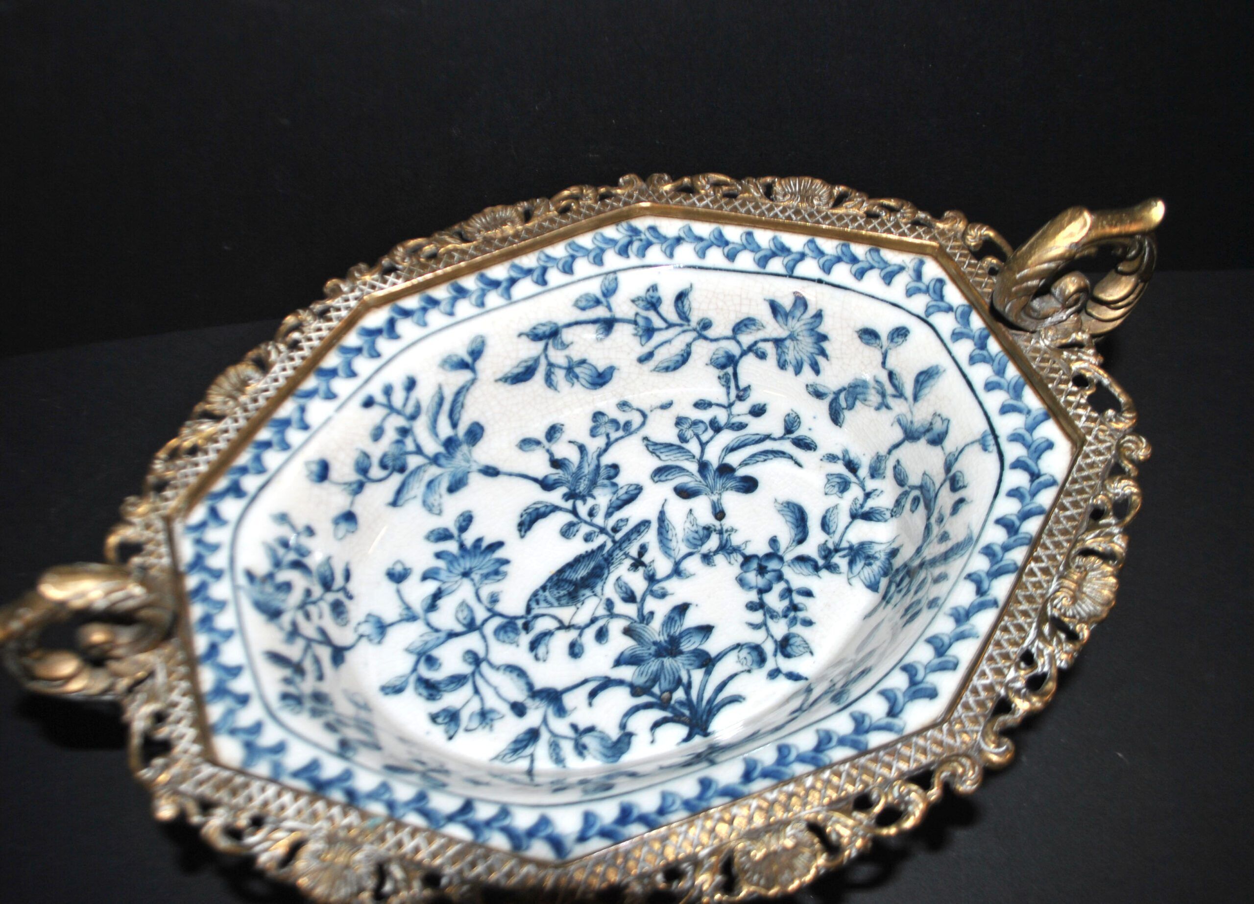 Blue Chinese floral porcelain coupe on a bronze base table centrepiece.