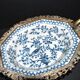 Blue Chinese floral porcelain coupe on a bronze base table centrepiece.