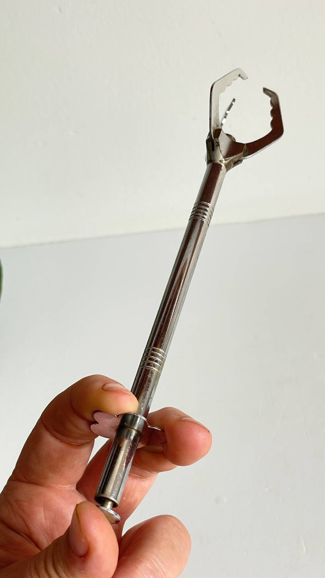 Long vintage chrome metal sugar tongs