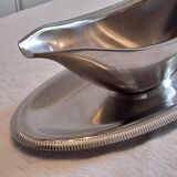 Very beautiful sauce boat from Létang Remi in very good condition.