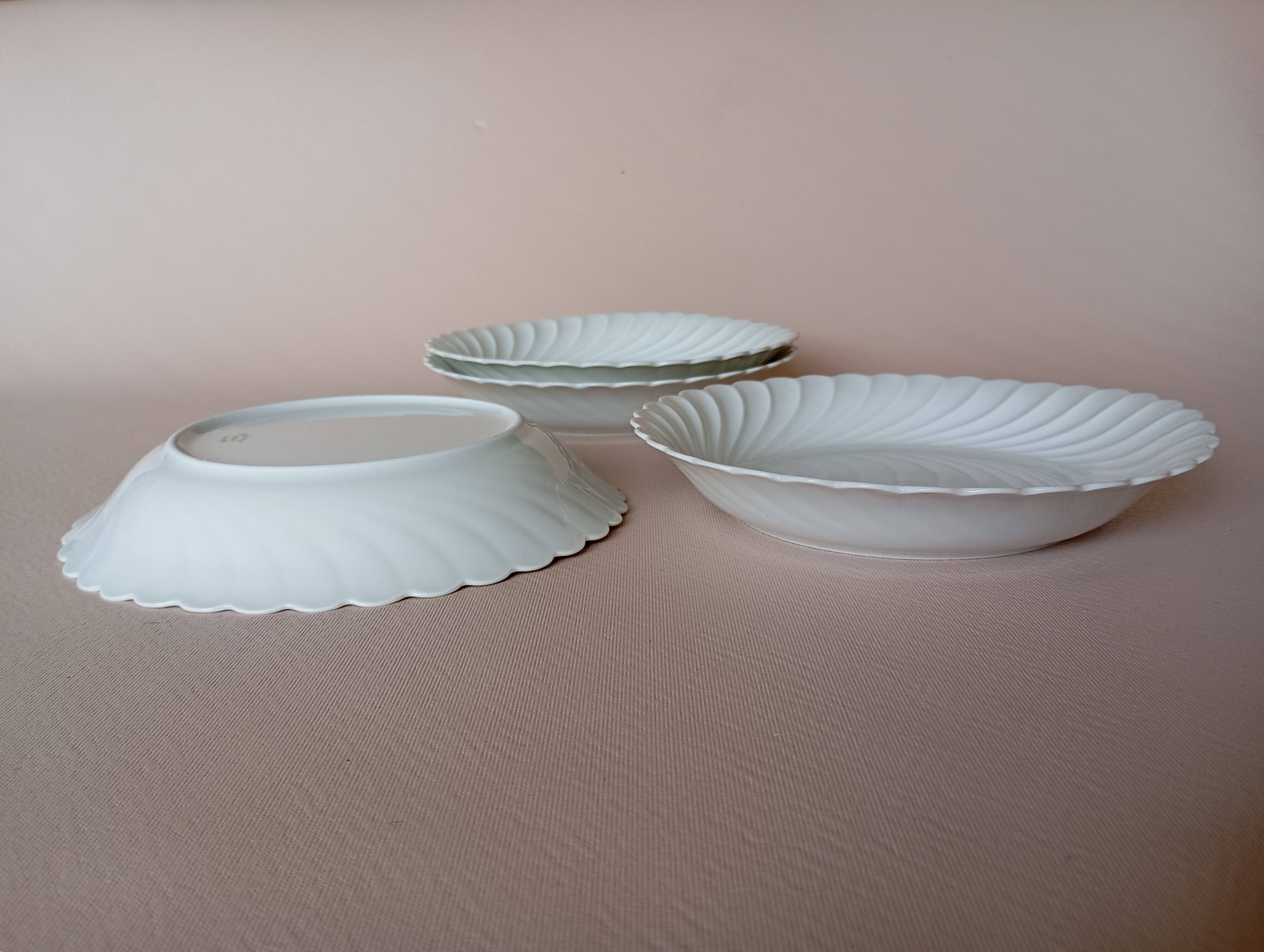4 Haviland Torse soup plates