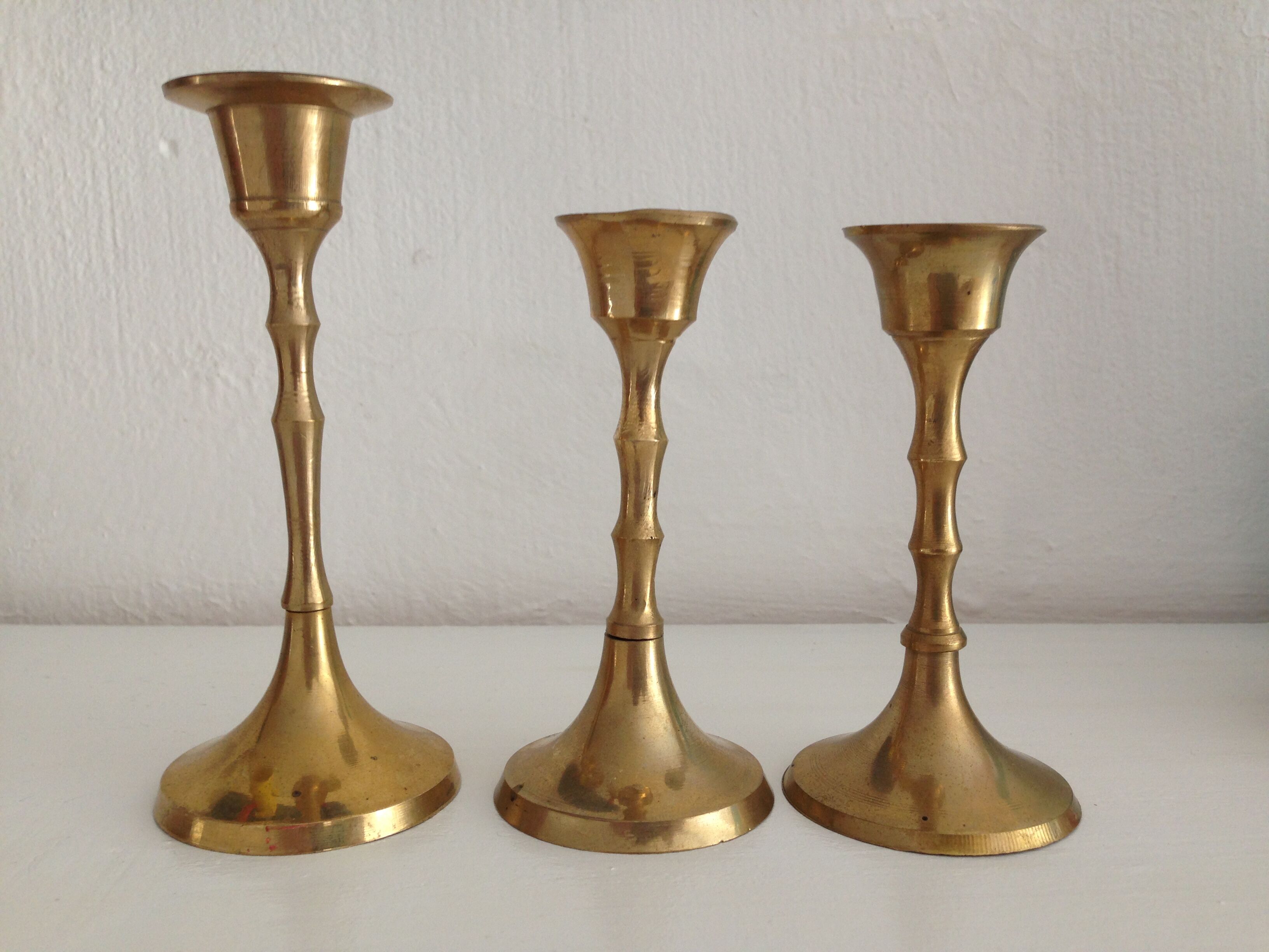 Set of 3 vintage brass candlesticks