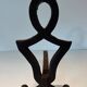 Pair of Modernist Andirons in Cast Iron with Stylised Figure Supports, by Ray