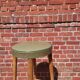 Tabouret Baumann 895 G2 en cuir vert
