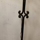 Floor lamp has four wrought iron lights