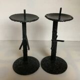 Pair of black metal candlesticks