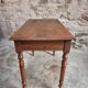 Antique French writing table in walnut with a drawer, circa 1900.