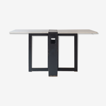 Extendable dining table with architectural base, Belgium 1960s. This folding table features two exte