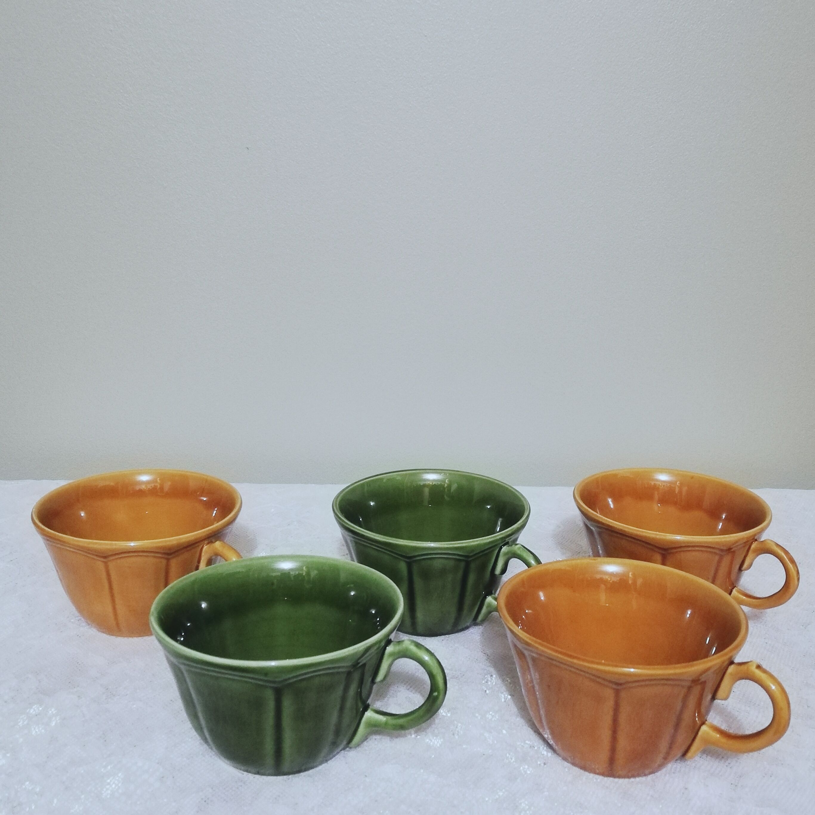5 coffee or tea cups signed Longchamp