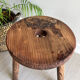 Three-legged wooden stool