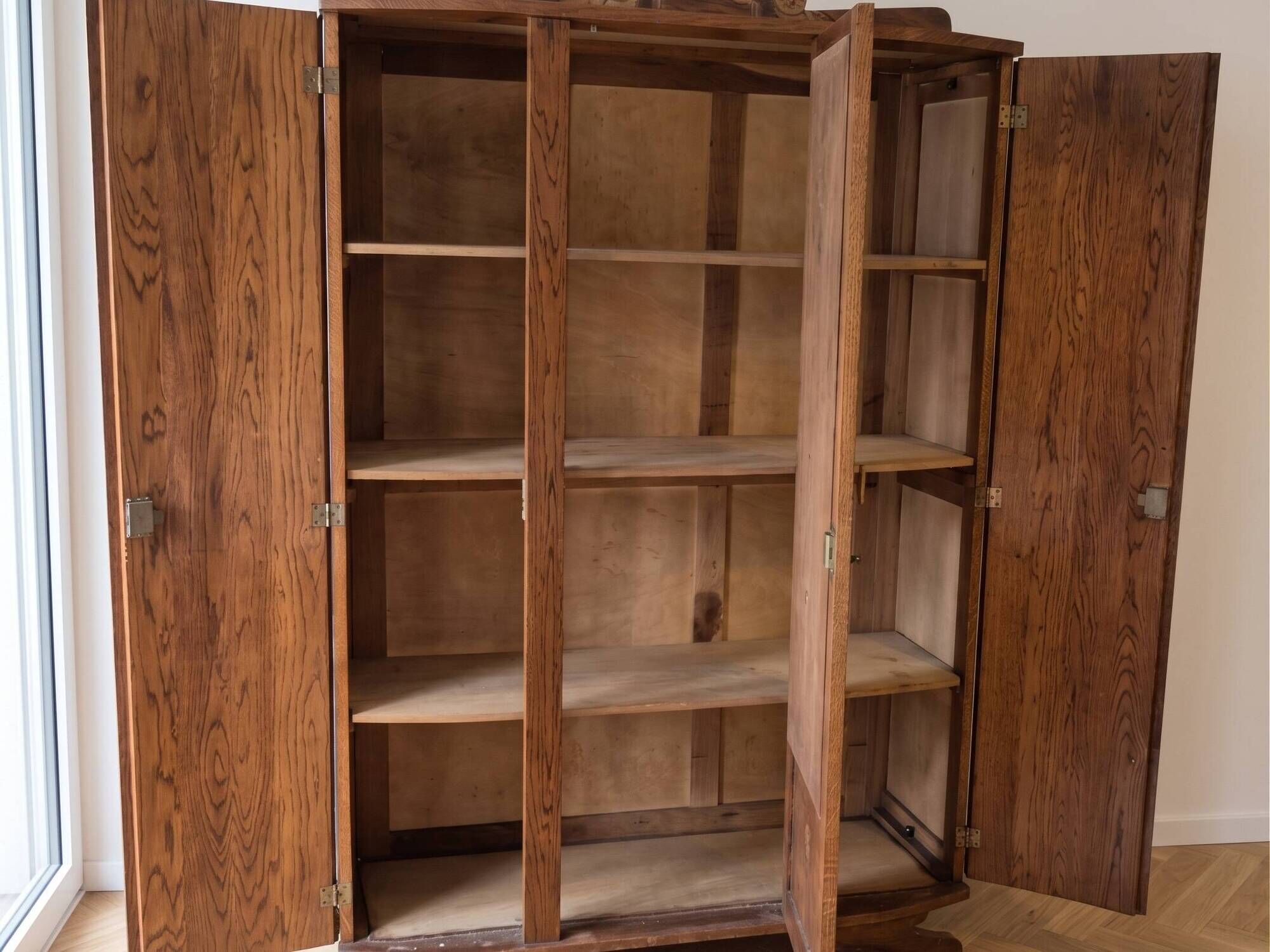 Antique Art Deco wardrobe in carved wood with mirror