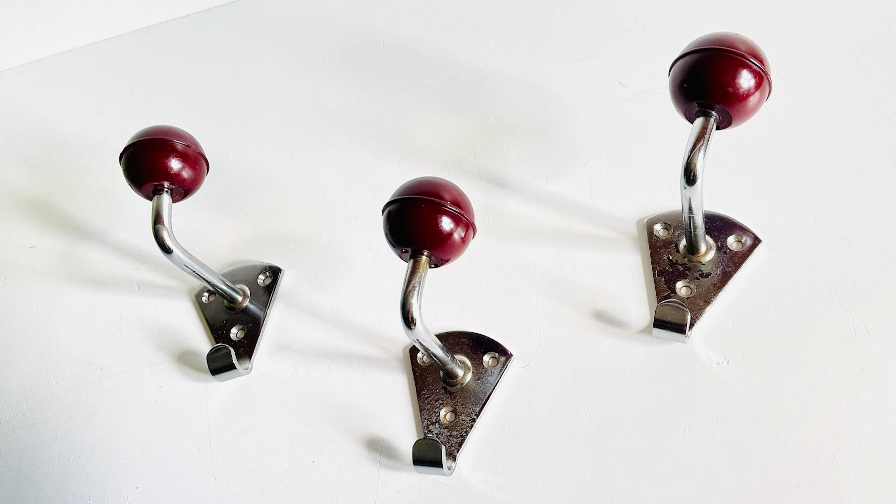 Chrome and bakelite coat hooks from the 70s