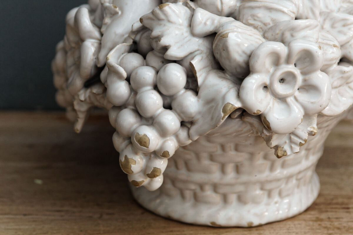 Ornamental basket decorated with trompe l'oeil fruits