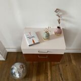 Wooden bedside table and nude