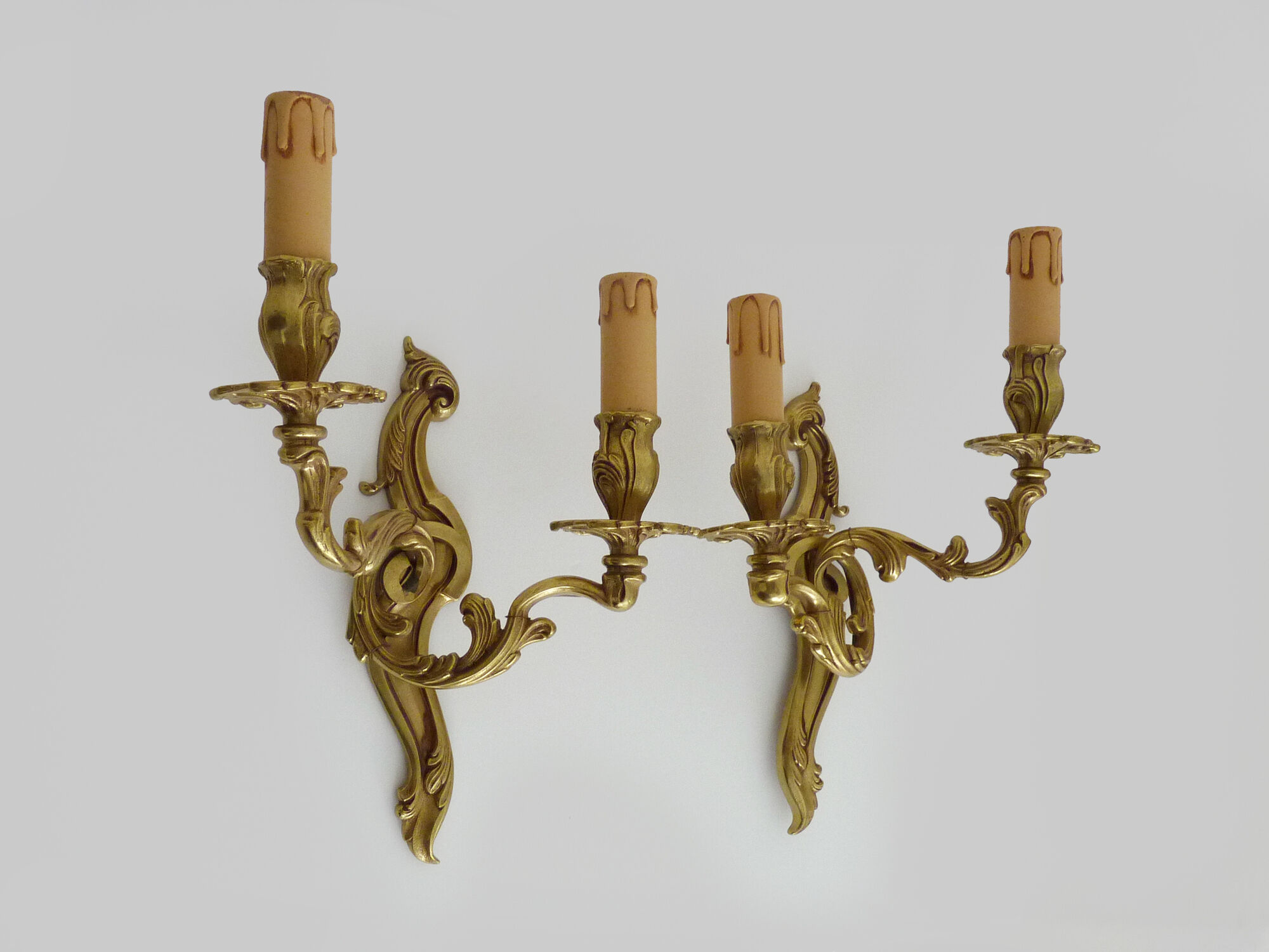 Old pair of wall sconces with double fires in bronze, 50s