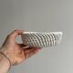 Small twisted porcelain bowl