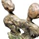 Sculpture of a man and a woman in spelter, signed Patsoglou