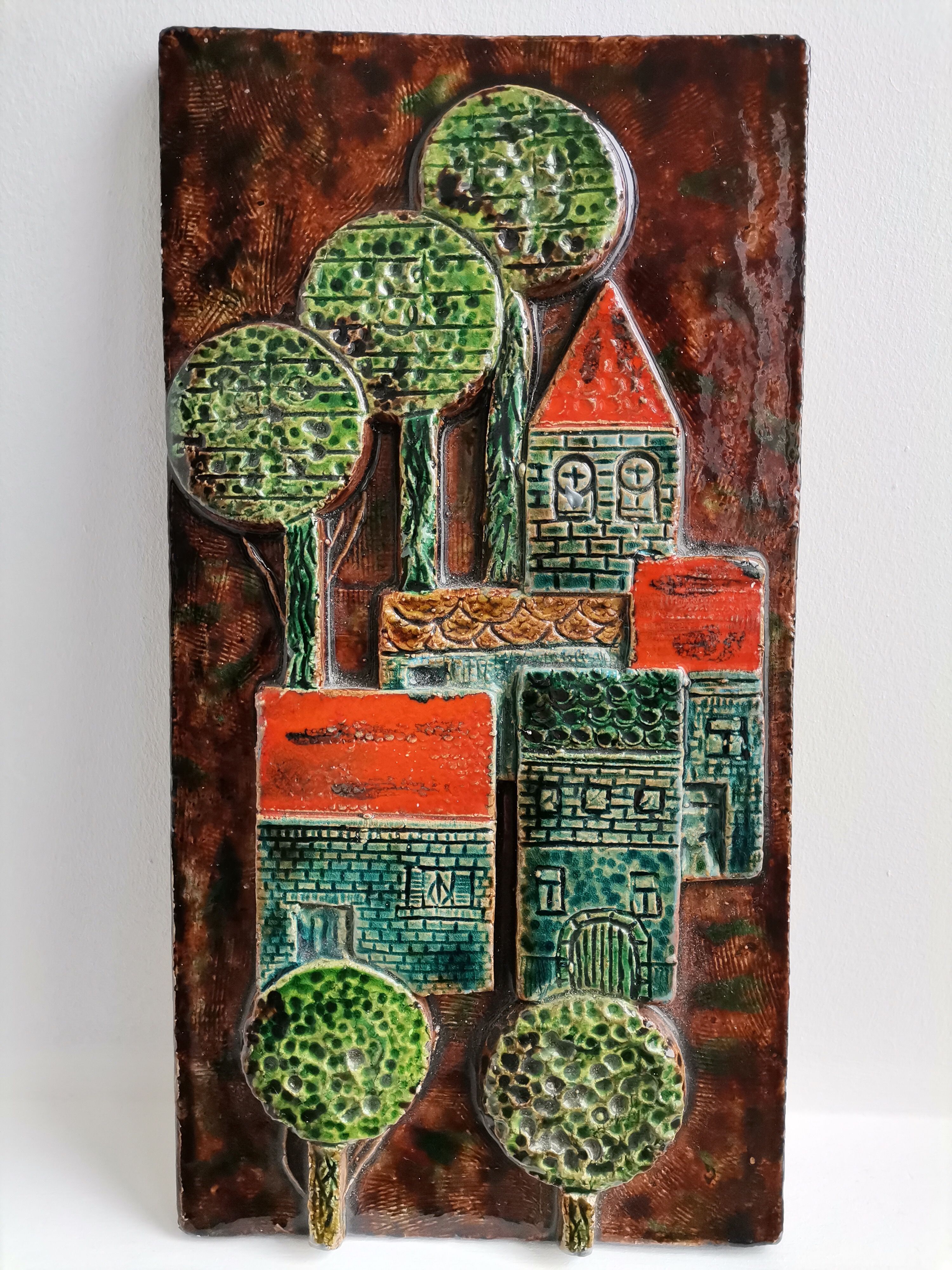 Decorative enamelled wall plate signed