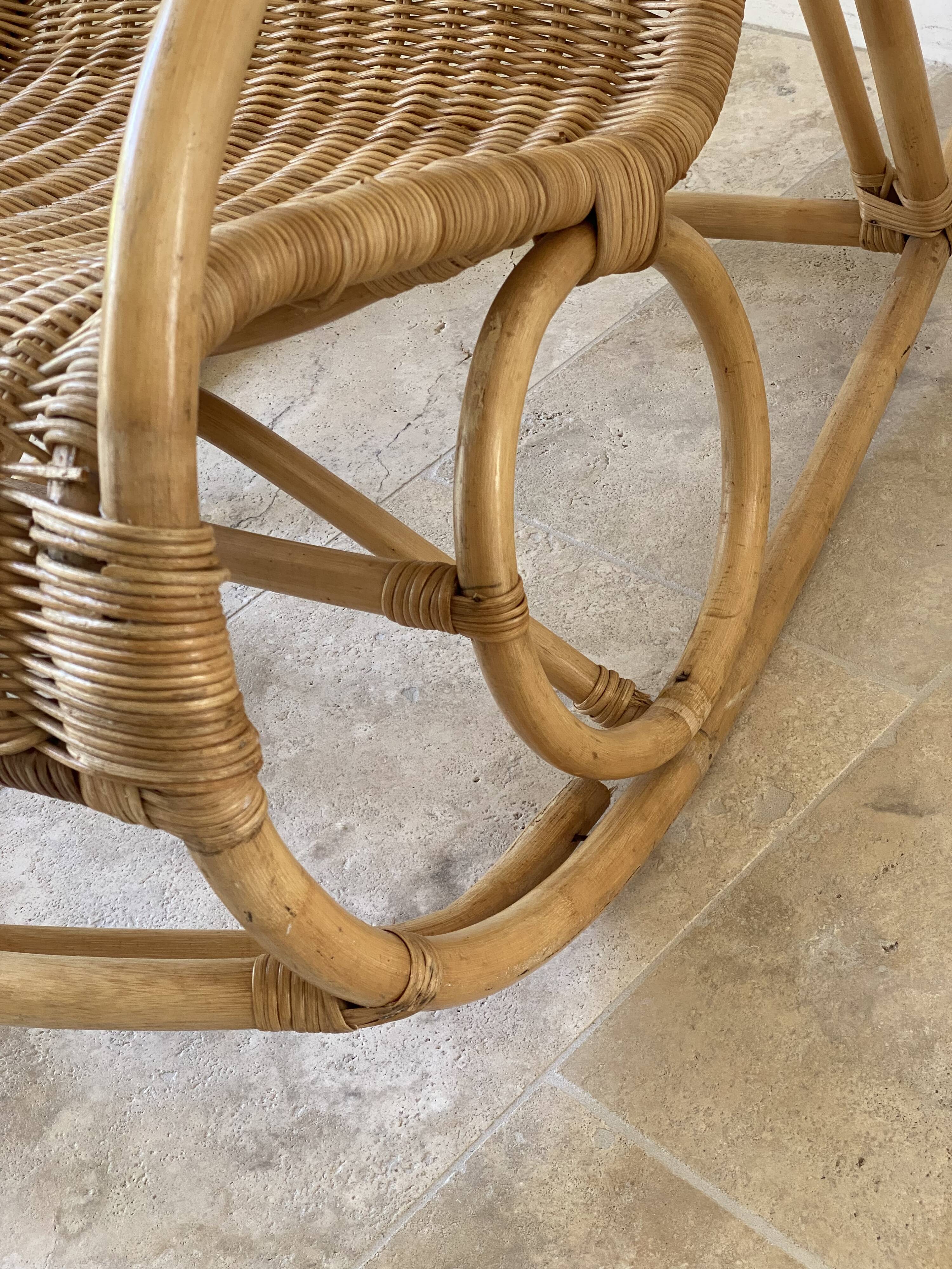 Natural rattan rocking chair.