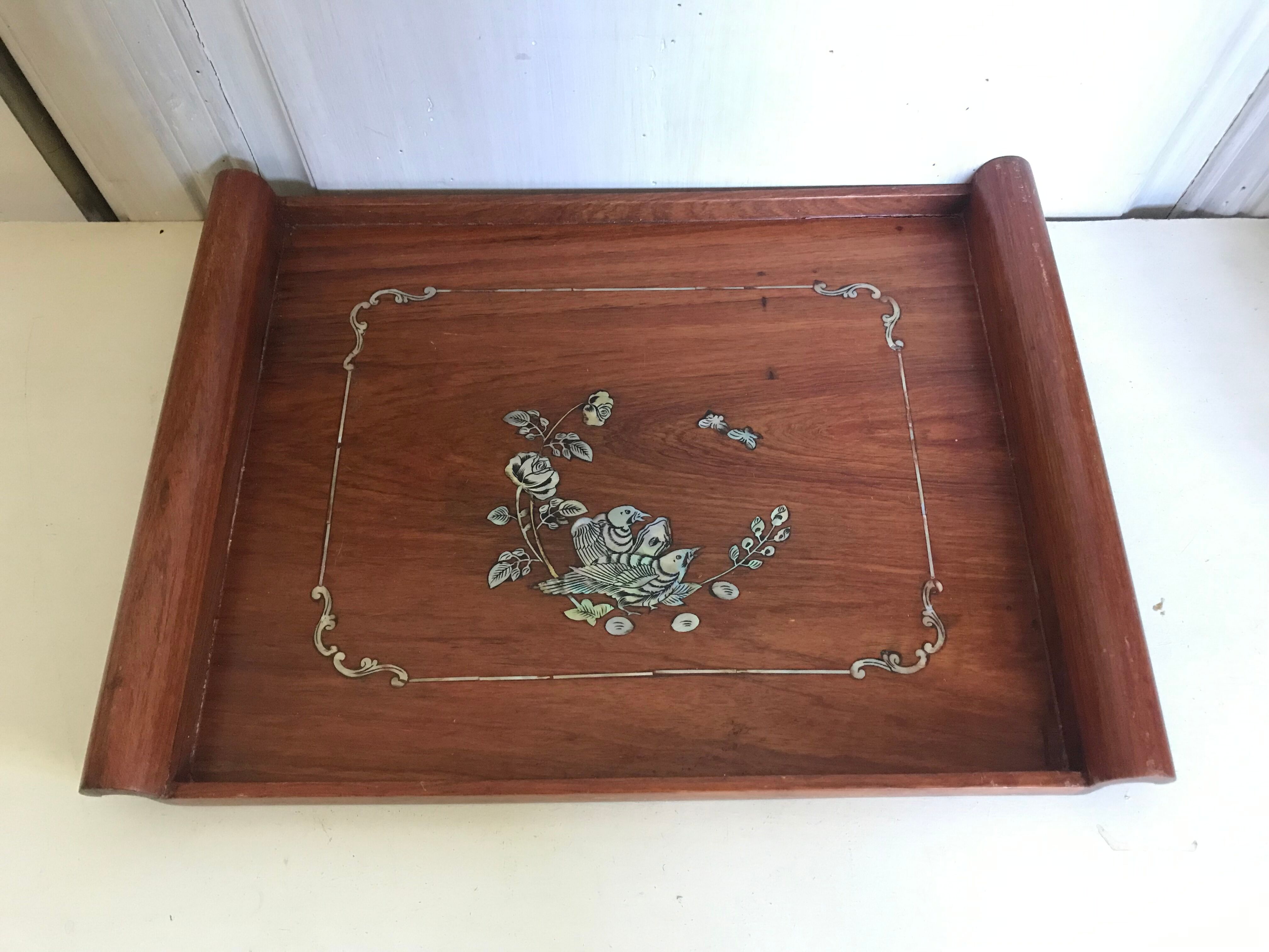 Wood and mother-of-pearl top