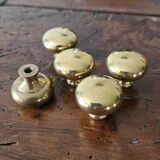 5 polished brass furniture knobs