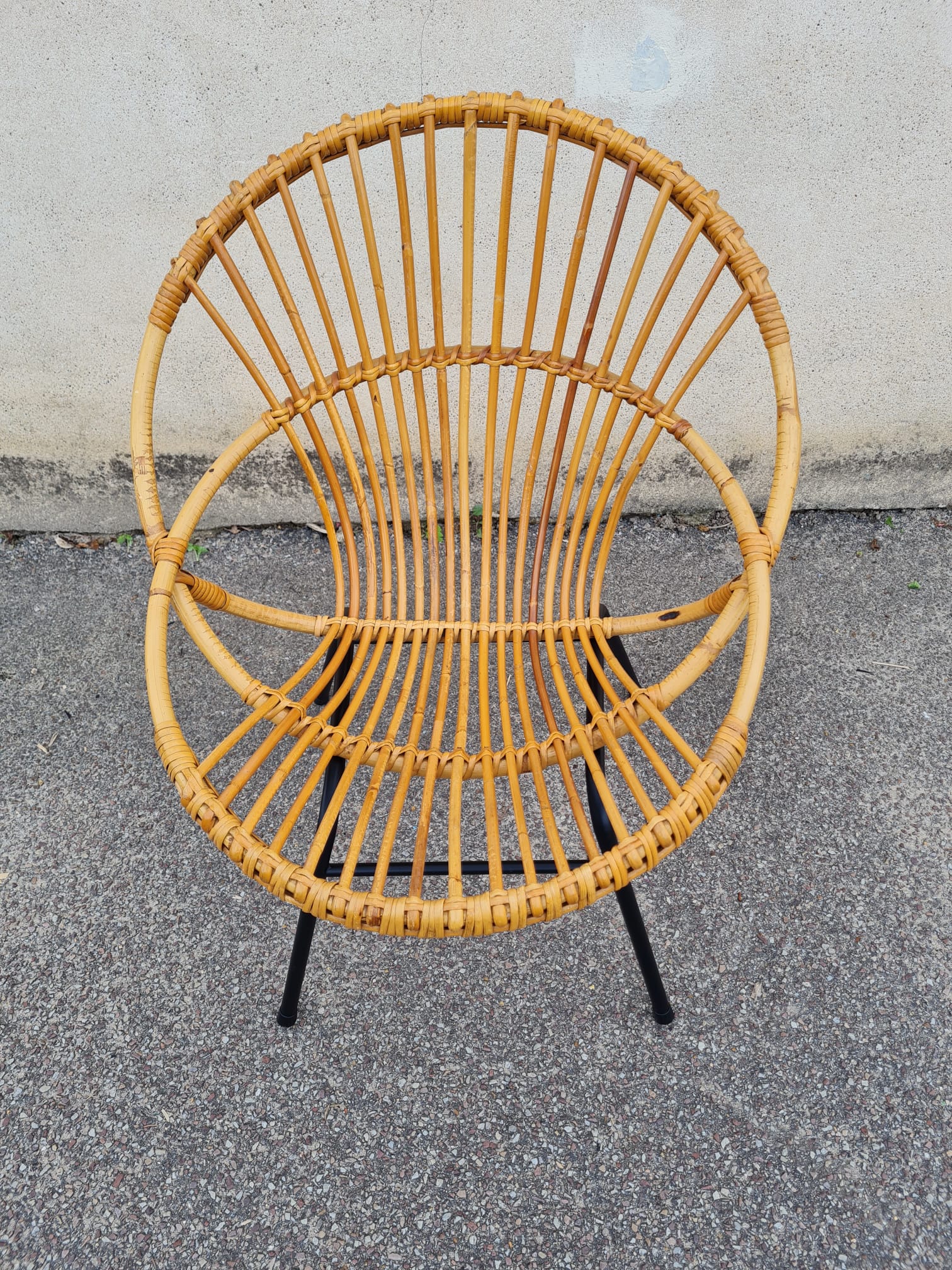 Vintage rattan shell armchair from the 60s
