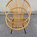 Vintage rattan shell armchair from the 60s