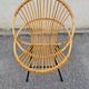 Vintage rattan shell armchair from the 60s