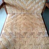 Pair of Art Deco woven rattan armchairs and table