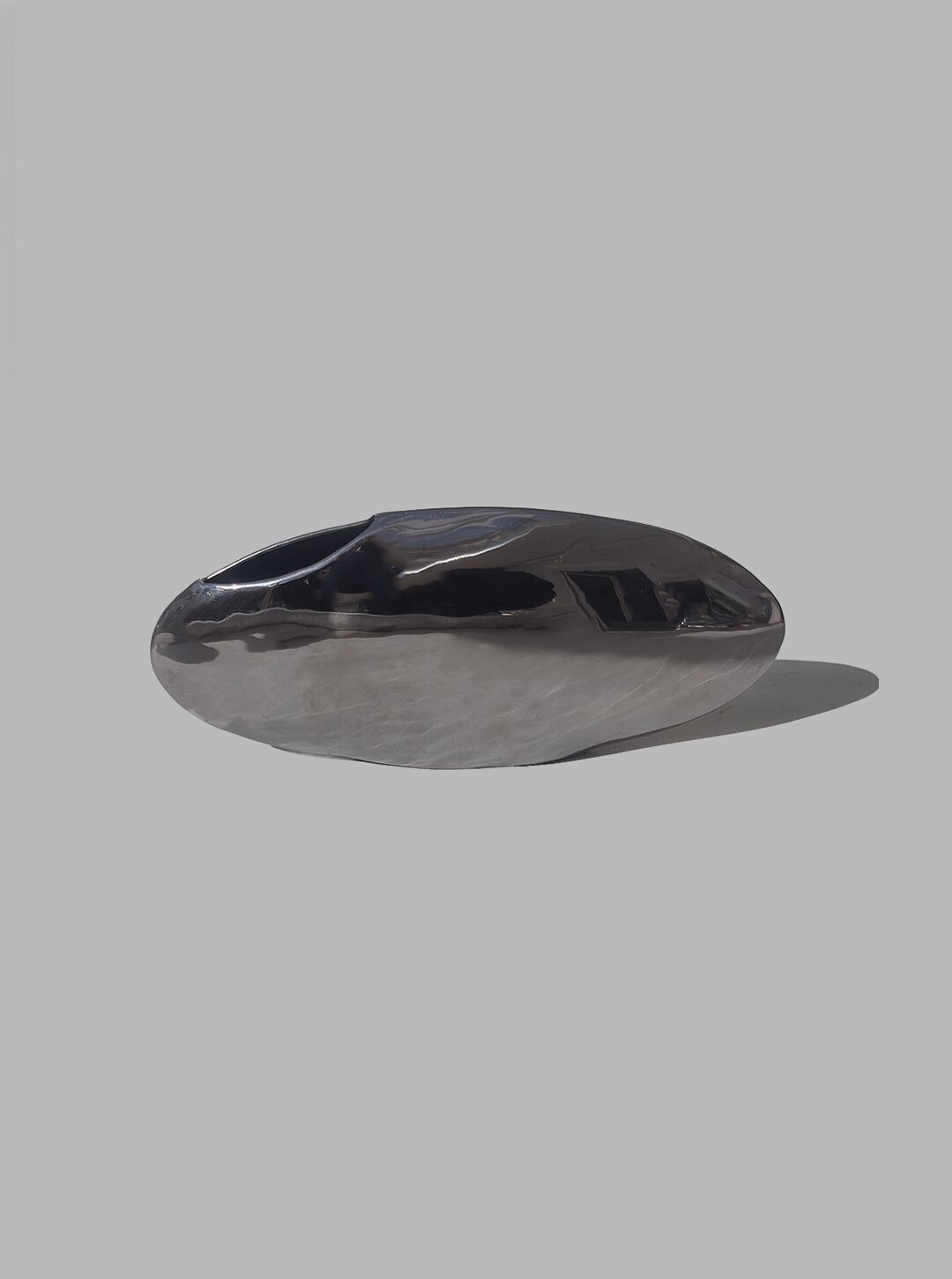 Minimalist oval steel vase
