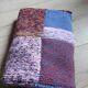 Plaid en patchwork tricoté main