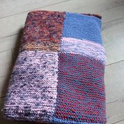 Plaid en patchwork tricoté main