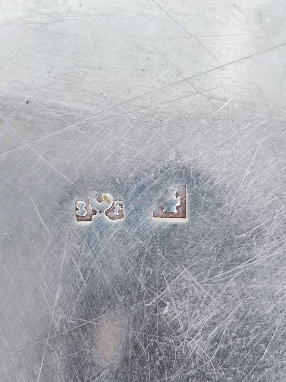 Trois sous-verres en métal argenté