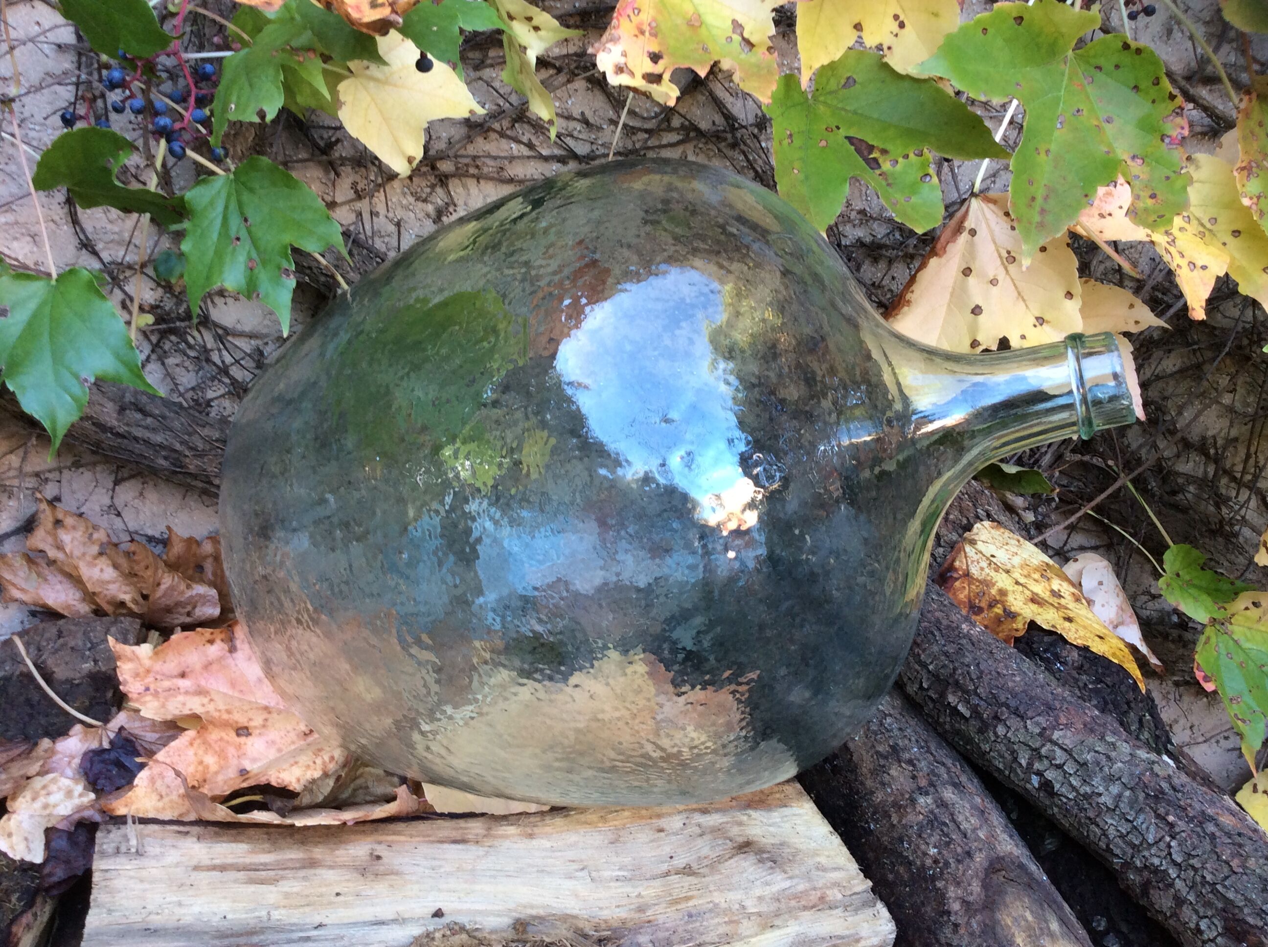 An old "Dame-jeanne" in blown glass, beginning of the nineteenth century