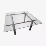Designer table in glass and metal
