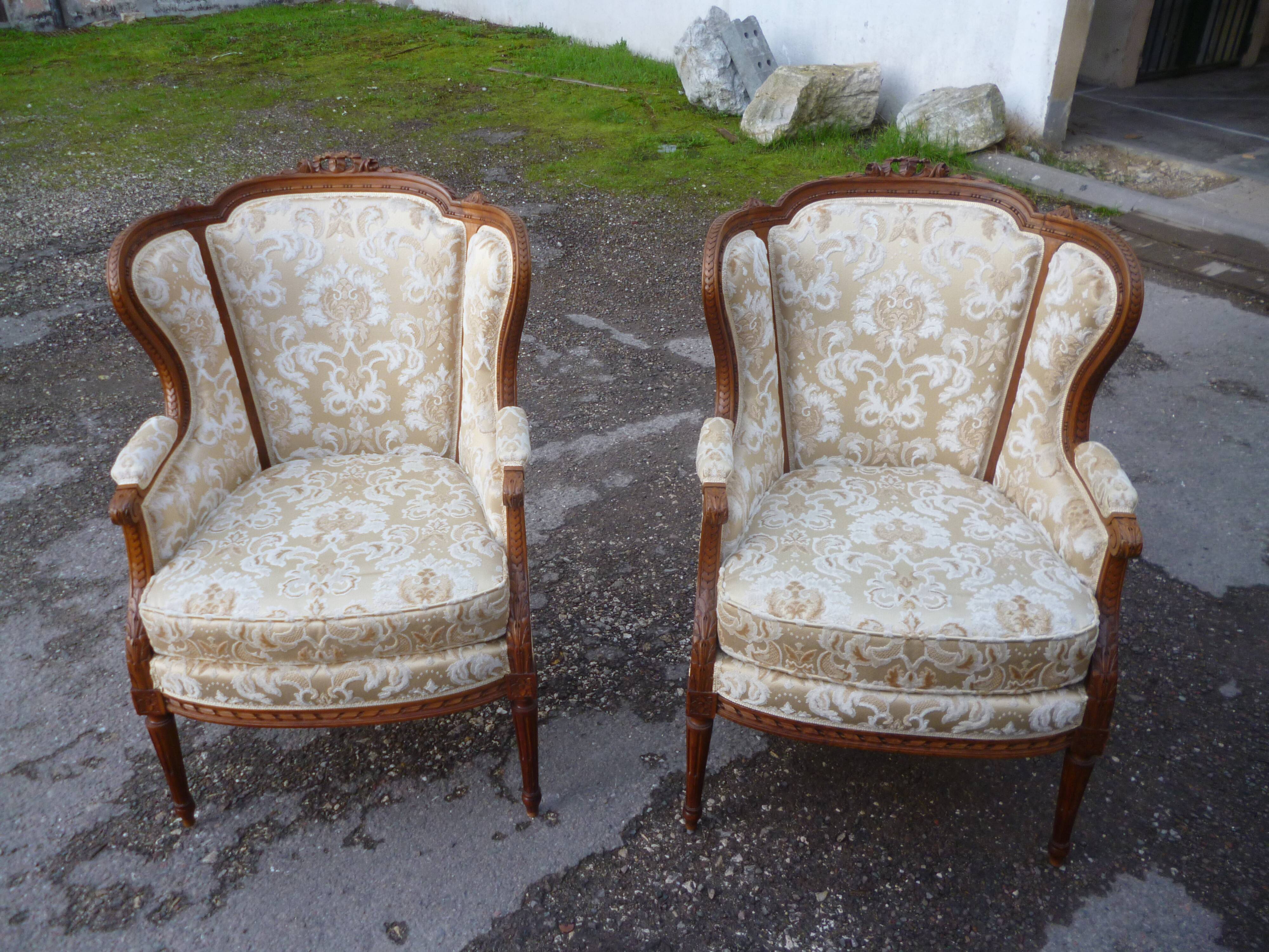 Pair of Louis XVI style armchairs with ears